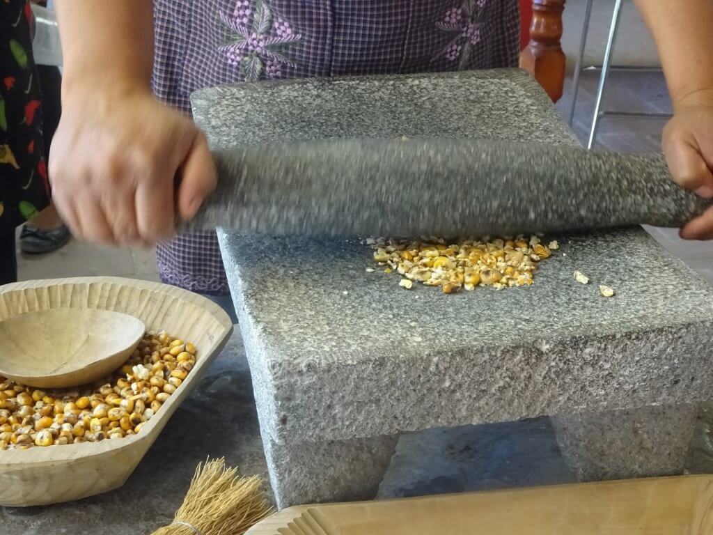 Grinding The Roasted Corn Natpacker