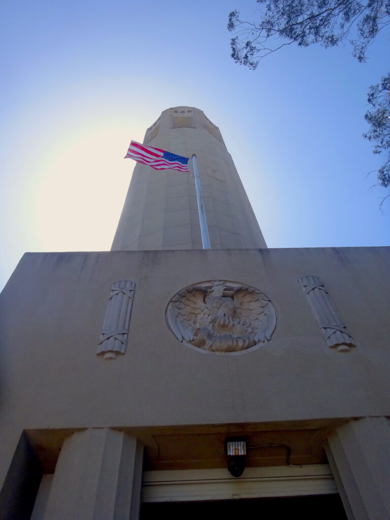 Coit Tower From Below With USA Flag