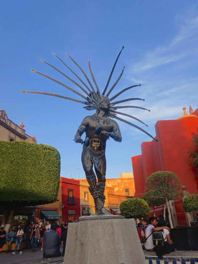 Statue Of Native Mexican With Large Headdress In Querétaro