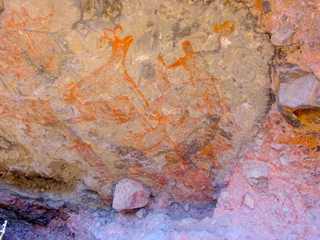 Ancient Rock Paintings Of Animals And Men